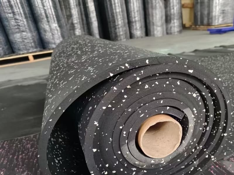 A clean, prepped concrete subfloor ready for rubber roll flooring installation.